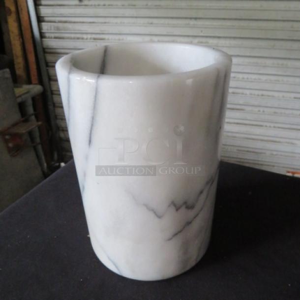5x7 heavy marble wine holder with a smooth, polished surface and natural veining. Excellent condition.