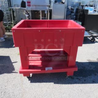 IRP portable beverage merchandiser with under shelf, on casters. Dimensions 24x36x35.5 inches. Red, used condition.