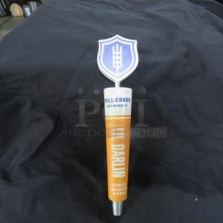 Mill Creek Brewing Co. beer tap handle, "Lil Darlin," citrus-infused wheat design, shield emblem on top, good condition.