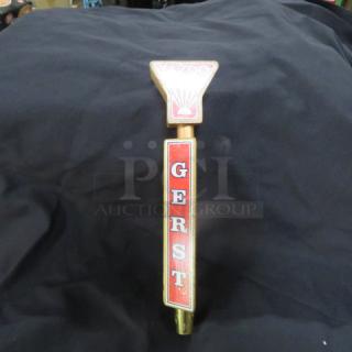 Gerst beer tap handle with red lettering, gold accents, and a harp logo. Good condition. Vintage collectible item.