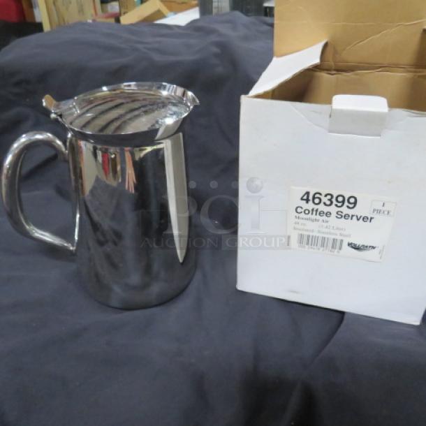 Vollrath 48oz insulated coffee server, stainless steel, model 46399, new condition, shown with original packaging.