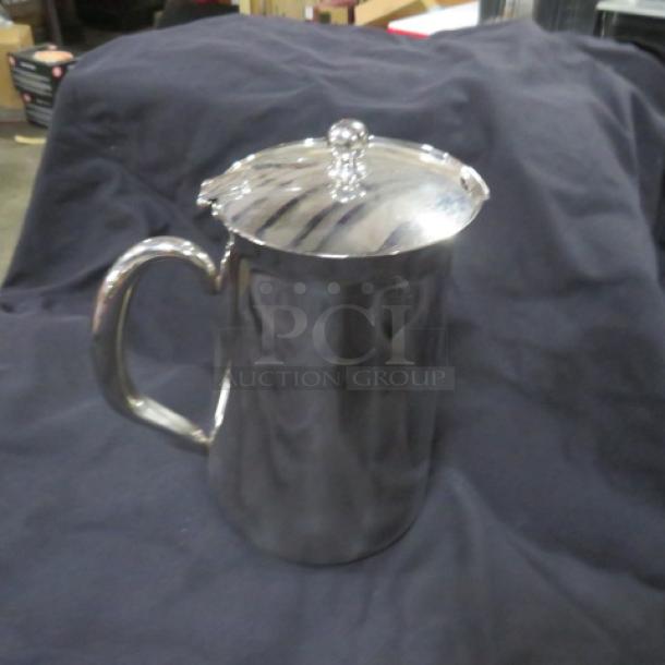 Vollrath Stainless Steel Coffee Server, model 46389, new condition, with polished finish and decorative lid knob.