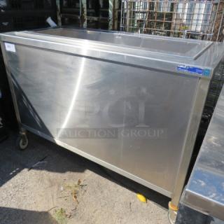 Vollrath stainless steel refrigerated cart, model 36652, on casters. Measures 52x25x35.5 inches. 120 Volt, excellent condition.