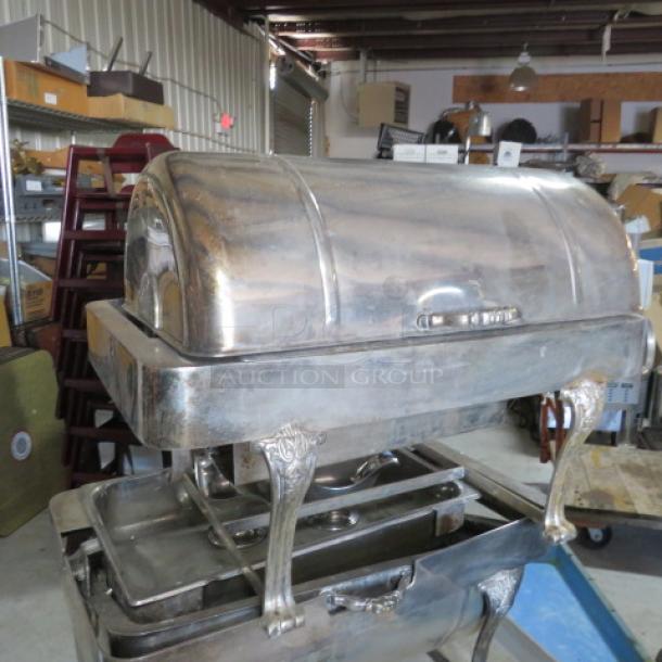 Vollrath model 46399 silver-plated roll top chafer, vintage full-size, ornate legs, heavy design, good condition.