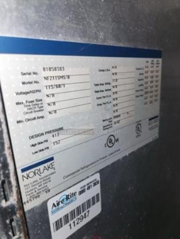 Norlake NFZ1SM5N/78 reach-in freezer label showing model, serial number, voltage details; excellent condition.