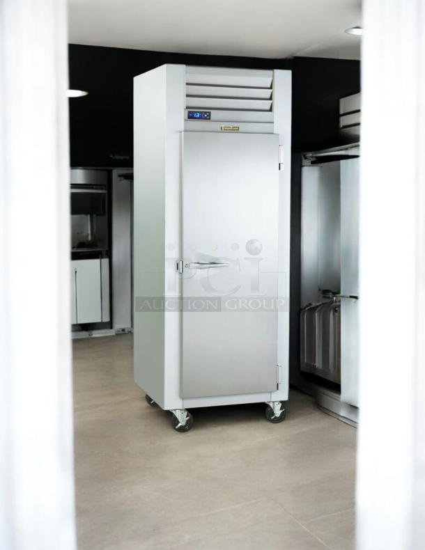 Superior condition Traulsen G12010 single door reach-in freezer, 115V, fully tested, stainless steel, on casters.