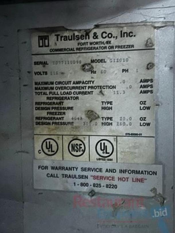 Traulsen G12010 Single Door Reach-In Freezer label, showing specifications, serial, voltage, and service contact info.