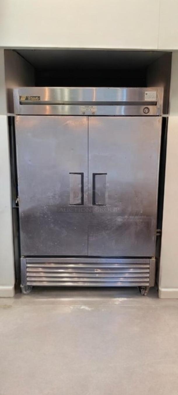 True T-49 2-Door Reach-In Refrigerator in immaculate condition, stainless steel exterior, fully tested and working, 115V.