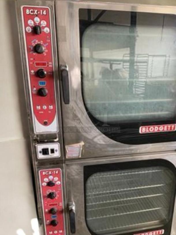 Blodgett BCX-14G double stacked gas combi oven/steamer, stainless steel, top-tier condition, 230,000 BTU, visible control panels.