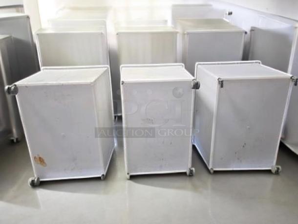 Set of three white ingredient storage bins on casters, with scoops and clear sliding lids. Fully tested, commercial grade.