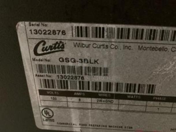 Curtis GSG-3BLK Coffee Grinder label showing serial number 13022876, voltage 120V, UL listed, in excellent condition.