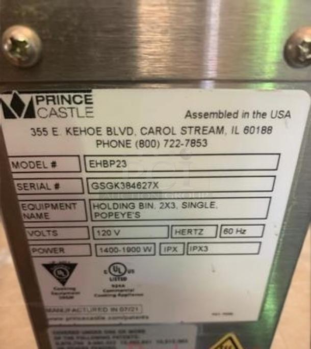 Prince Castle EHBP23 holding bin label showing model, serial number, 120V, 2x3 configuration for Popeye’s, in outstanding condition.