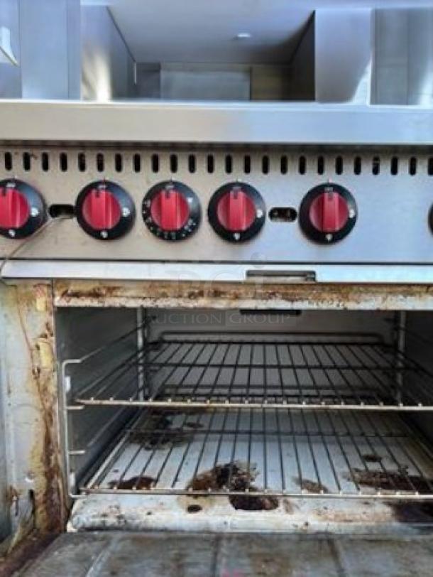6-burner commercial gas range with standard oven, heavy-duty line, natural gas. Great condition, fully tested and working.