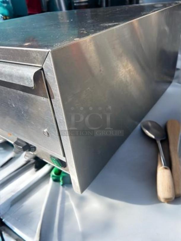 Avantco HDG-11 Hot Dog Roller Grill, 11 rollers, nonstick, top-tier condition, 30 hot dog capacity, 120V, fully tested.