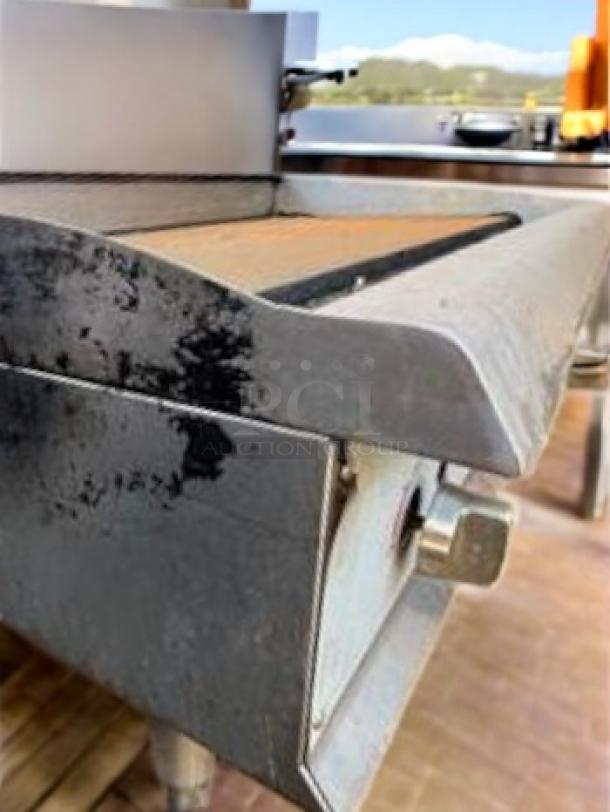 Cooking Performance Group CPG-48NL 48" countertop gas griddle with manual controls. Natural gas, excellent condition.