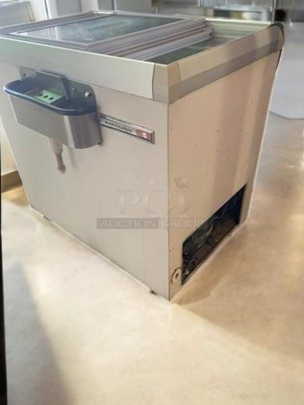 Commercial sliding glass top freezer, restaurant grade, excellent condition, tested, 115V, ideal for ice cream or beverages.