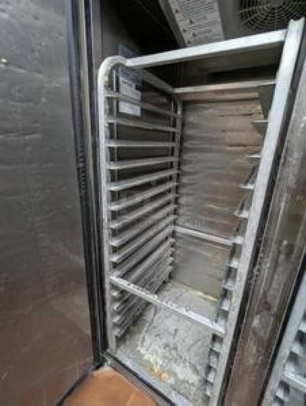 Turbo Air TSF-49SD-N 54" reach-in freezer, superb condition, two solid doors, 115V, fully tested, interior racks visible.