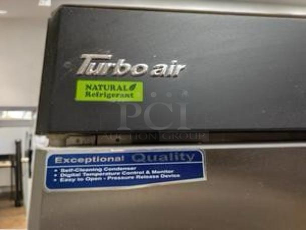 Turbo Air TSF-49SD-N Reach-In Freezer, 54", superb condition, solid double doors, 115V, "Natural Refrigerant" label.