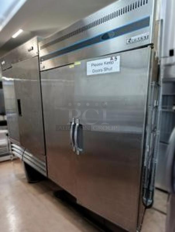 Everest ESR2 49" reach-in refrigerator, dual solid doors, top-mounted compressor, in immaculate condition.