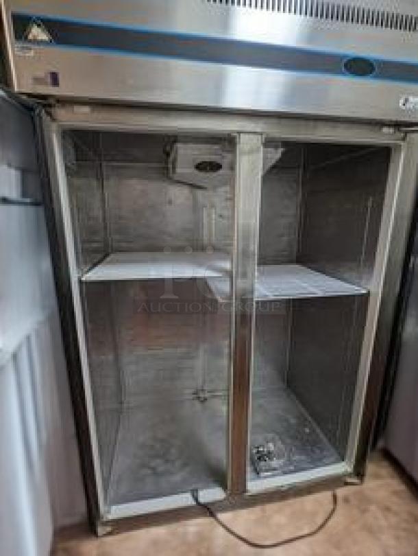 Immaculate Everest ESR2 49" reach-in refrigerator with dual solid doors, top-mounted compressor. Fully tested, 115V, excellent condition.
