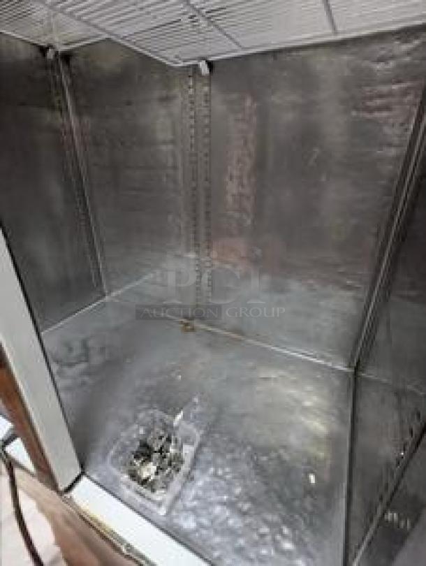 Everest ESR2 49" reach-in refrigerator interior, immaculate condition, dual solid doors, top-mounted compressor, 115V.