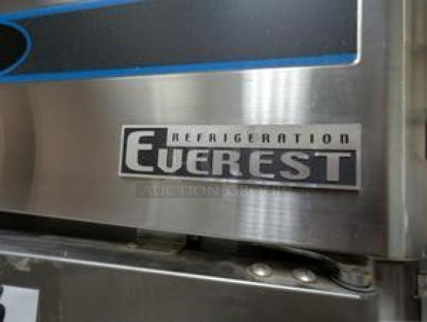 Everest ESR2 49" reach-in refrigerator, dual solid doors, immaculate condition, 115V, Everest logo visible.