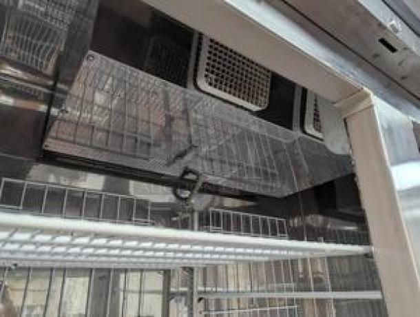 Randell R4S-6 refrigerator interior showing shelves and ventilation, demonstrating top-tier condition, 54" double-door model, tested and working.