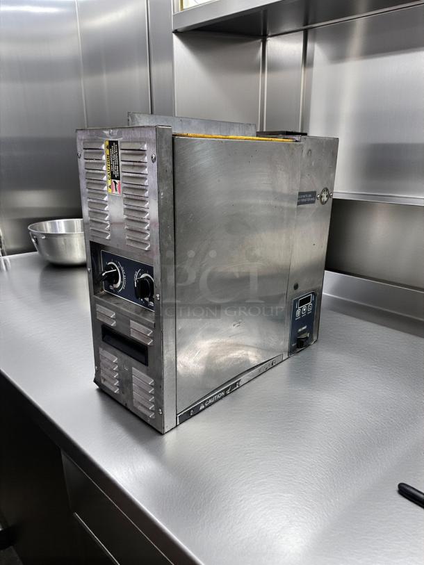 Superior Condition Roundup Conveyor Toaster with Butter Wheel, fully tested, 208V, stainless steel, commercial use.