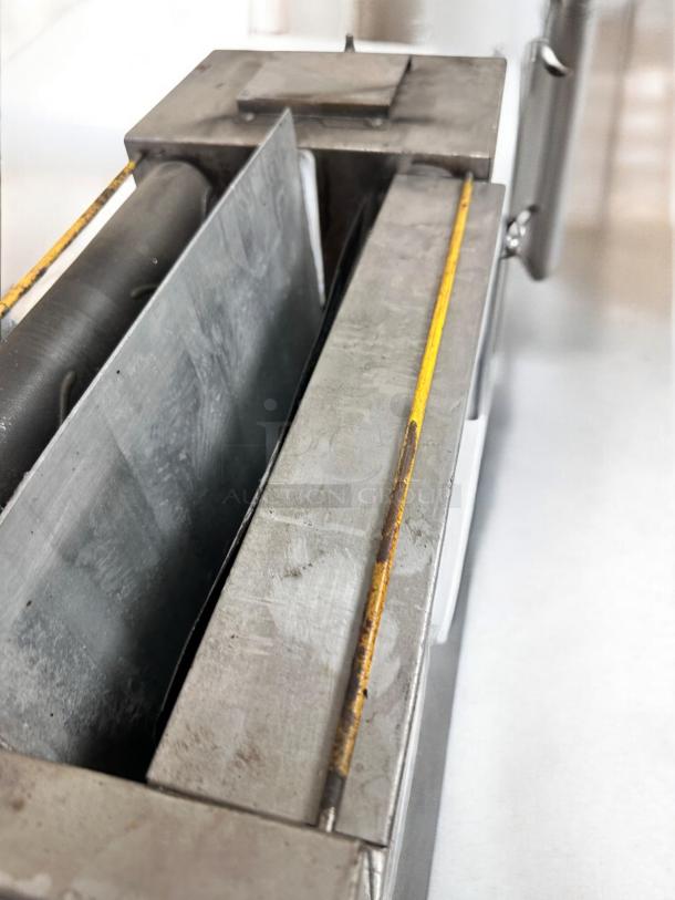 Roundup conveyor toaster with butter wheel in superior condition, 208V, fully tested and working. Commercial foodservice equipment.