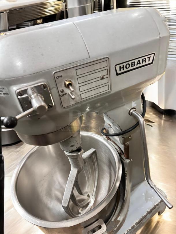 Hobart commercial mixer, planetary bench model in outstanding condition, 115V, fully tested. Visible on/off toggle switch, branded Hobart.
