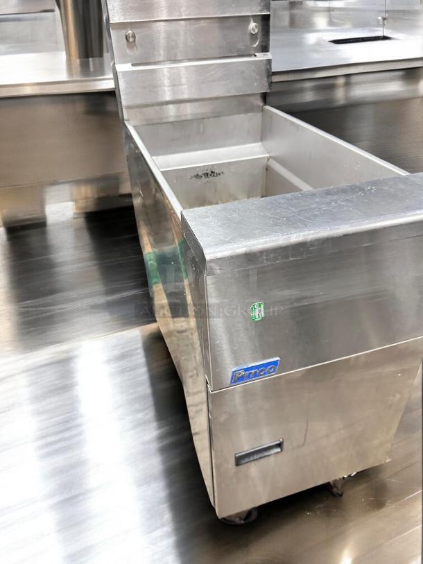 Pristine Pitco SG14S gas fryer, 40 lb capacity, natural gas, stainless steel, excellent condition, maker's label visible.