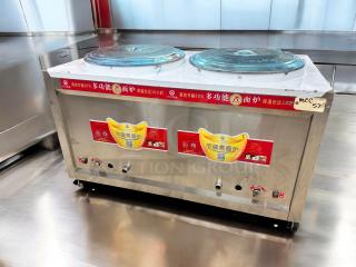 Commercial dual-basket noodle boiler, 220V, outstanding condition, fully tested. Includes control panel and informative labels.