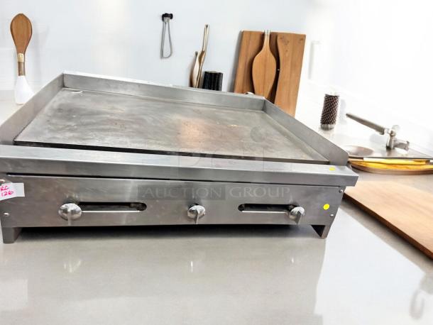 Commercial Grade 36" Stainless Steel Flat Top Gas Griddle, superb condition, fully tested, dual control knobs visible.