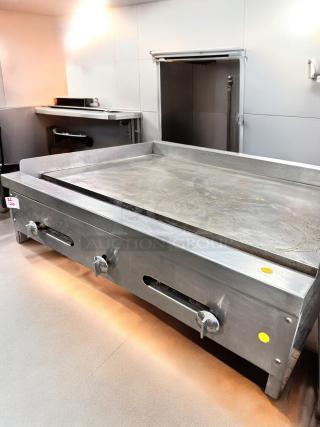 Commercial grade 36" stainless steel flat top gas griddle, superb condition, fully tested, dual control knobs.