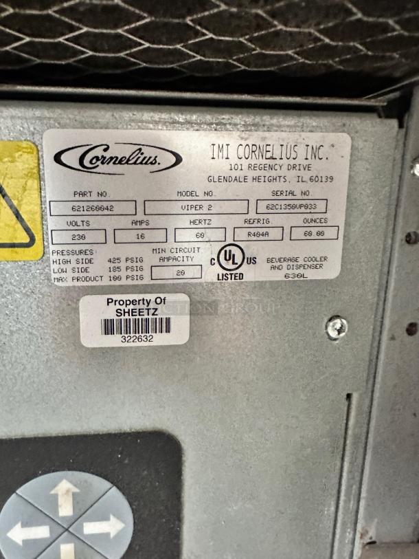 Label on Cornelius Viper 2 beverage machine indicates model and serial number, voltage, amperage, and UL listing.