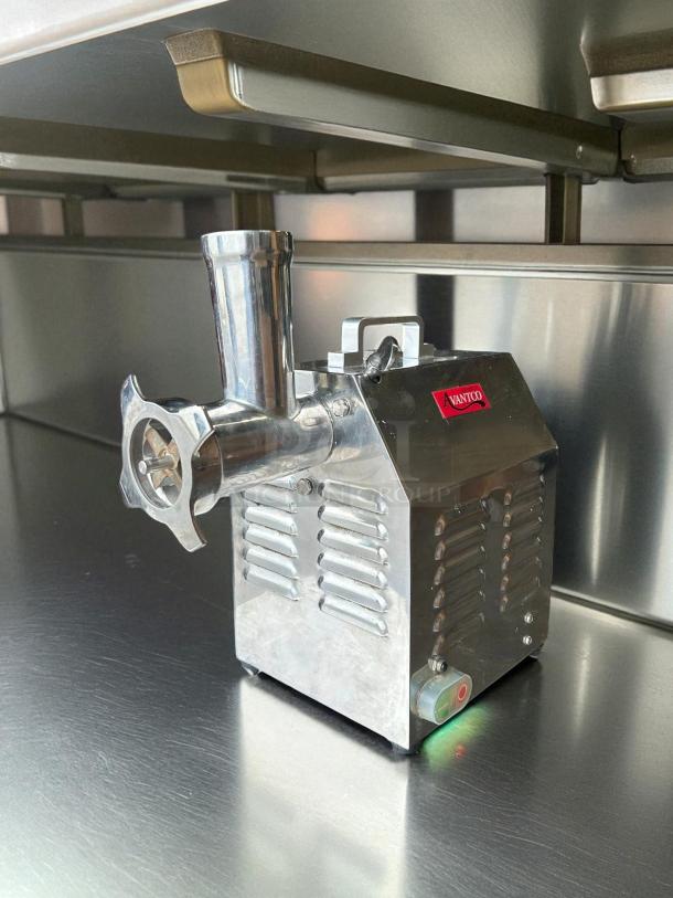Alt text: Avantco MG12R #12 Meat Grinder, 110V, 1 hp, stainless steel, reverse setting, tested and working, brand logo visible.