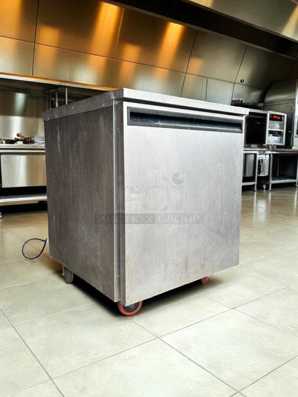 Delfield 407 undercounter freezer, single-section, 27"W, excellent condition, stainless steel, tested and working, 115v.