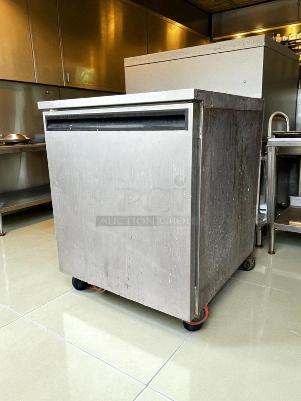 Delfield 407 undercounter freezer, single-section, stainless steel, 27"W, excellent condition, tested and working.