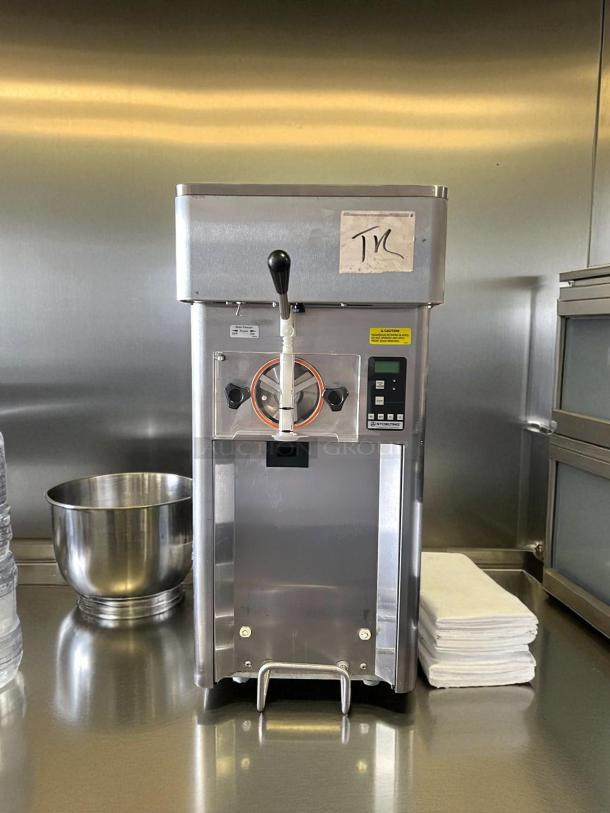 Stoelting F111-38I soft-serve freezer, countertop model in working condition, single flavor, gravity operation, 17-quart capacity.