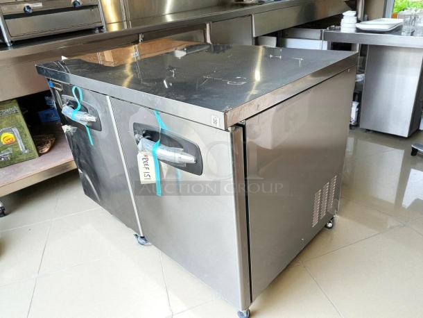 New Master-Bilt MBUR48 undercounter refrigerator, stainless steel, tested and working, dual doors, protective wrap on handles.