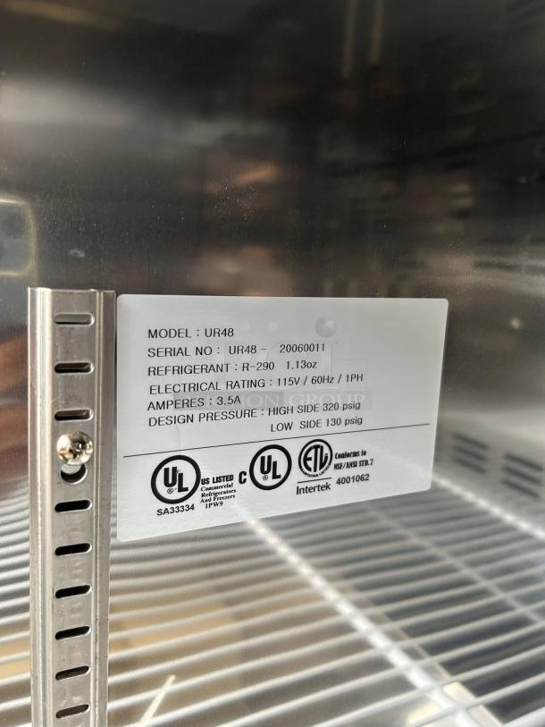 Master-Bilt MBUR48 undercounter refrigerator label shows model, serial number, refrigerant type, electrical specs, and UL listings.