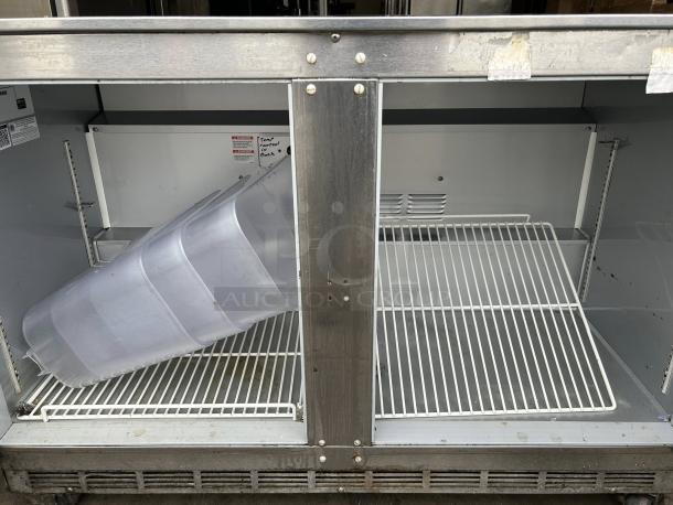 Beverage-Air UCR48AHC-23 undercounter refrigerator, 48" width, dual wire shelves, interior view, tested and working condition.