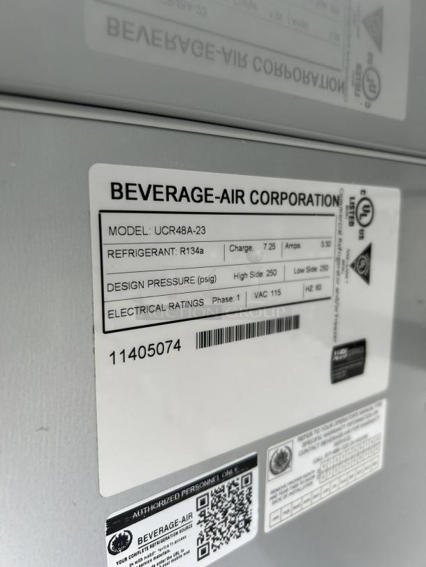Beverage-Air UCR48AHC-23 undercounter refrigerator label showing model details, refrigerant type, and electrical ratings.