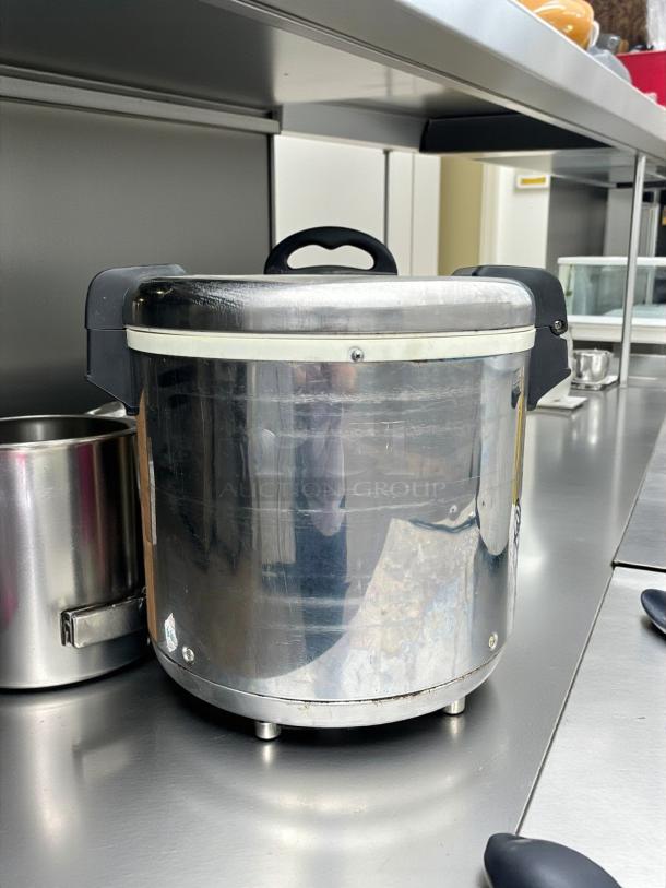 Thunder Group SEJ22000 50 cup electric rice warmer in excellent condition, stainless steel, tested and working, 120v.
