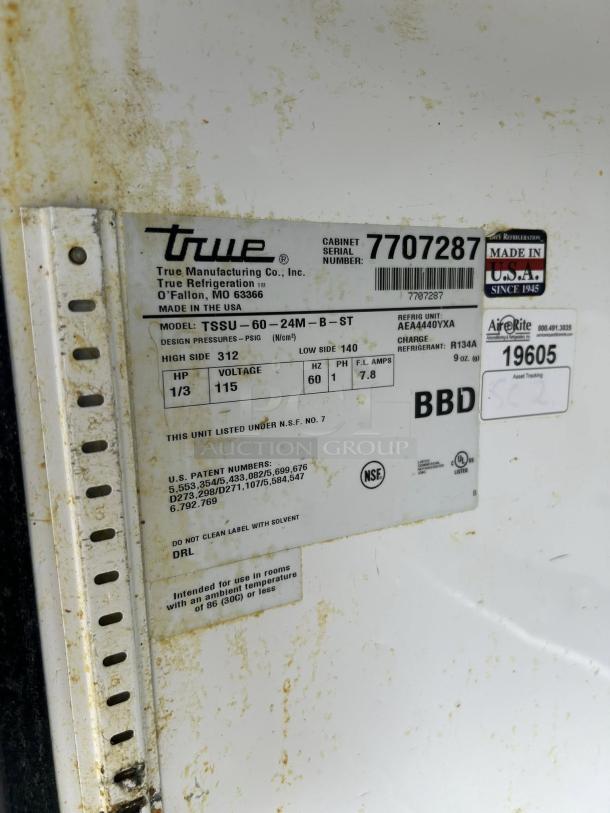 True TSSU-60-24M-B-ST-HC label, showing model, voltage (115v), serial number (7707287), and manufacturing details.