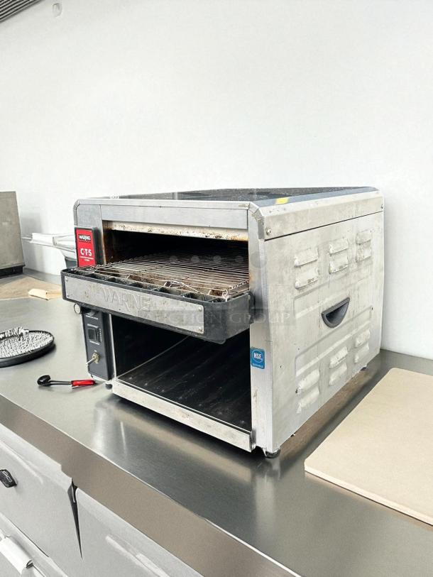 Waring CTS1000 commercial conveyor toaster, 120V, stainless steel, tested and working, NSF certified, used condition.