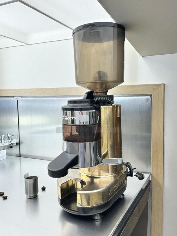 Gino Rossi RR45 coffee grinder, commercial, fully automatic, tested and working, stainless steel casing, visible wear.