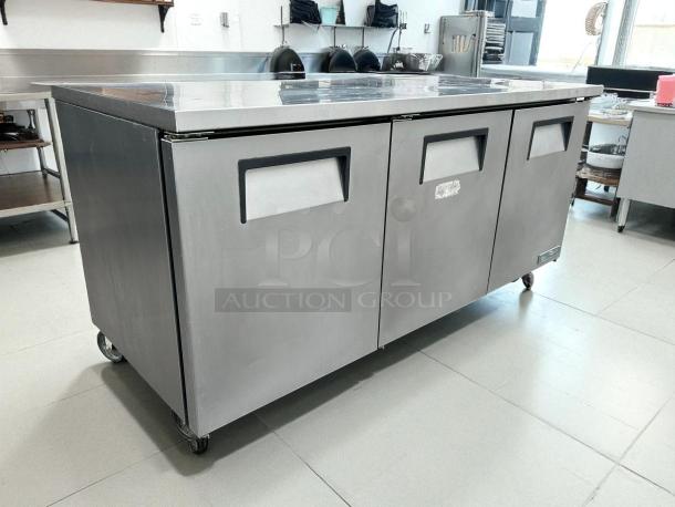 True TUC-72-HC 72" undercounter refrigerator with 3 sections and doors, stainless steel, excellent condition, 115v.