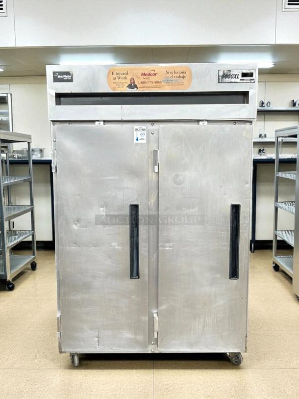 Delfield 6151XL-S 50" two-section reach-in freezer, excellent condition, tested, stainless steel, 115V, visible stickers.