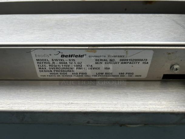 Delfield 6151XL-S label showing model, serial number, electrical requirements, refrigerant, and design pressures.